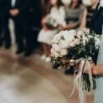 Bridesmaid holding luxurious wedding bouquet