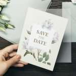 Elegant wedding invitation card with floral design