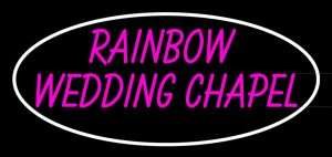 Neon Rainbow Wedding Chapel sign on black background.