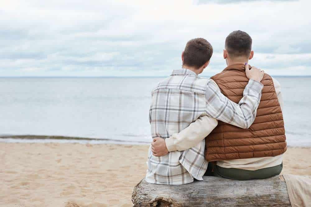 Gay couple enjoying at beach