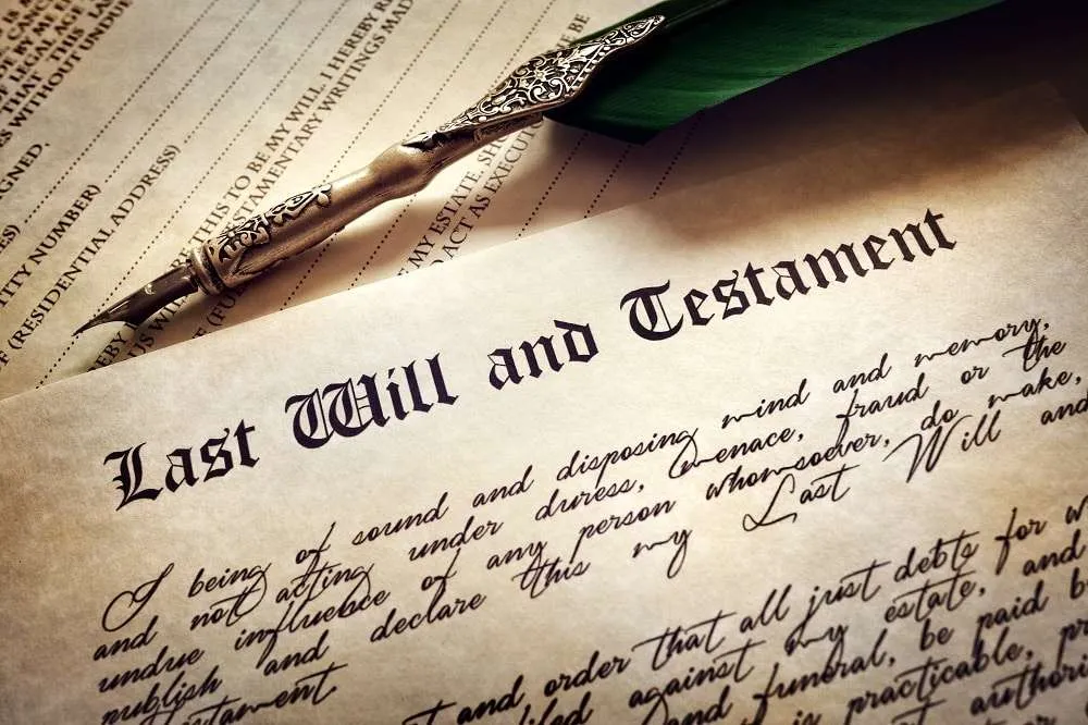 Antique quill on a Last Will and Testament document